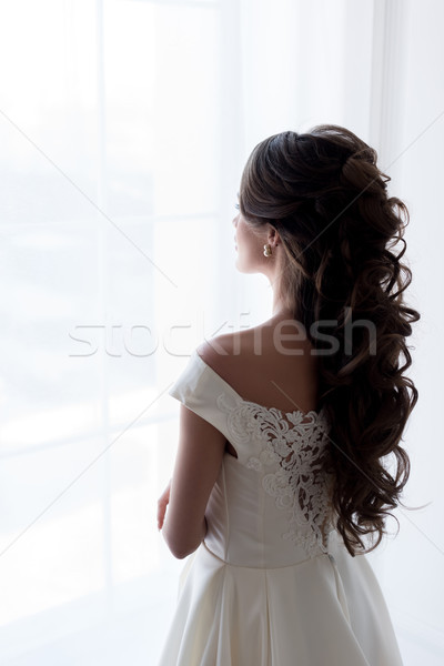 вид сзади невеста подвенечное платье глядя окна свадьба Сток-фото © LightFieldStudios