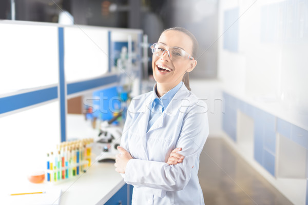 portrait of cheerful scientist in uniform looking to camera Stock photo © LightFieldStudios