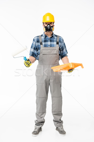 Workman with paint roller     Stock photo © LightFieldStudios