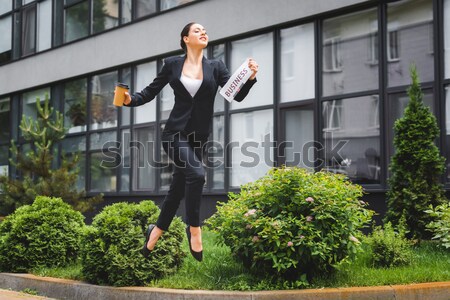 businesswoman running to work Stock photo © LightFieldStudios