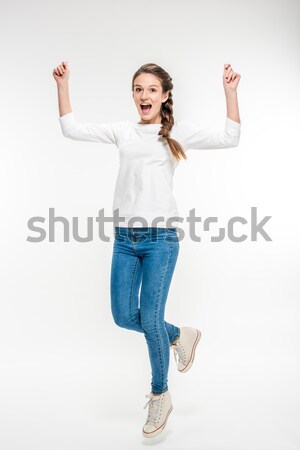 Exited young woman  Stock photo © LightFieldStudios