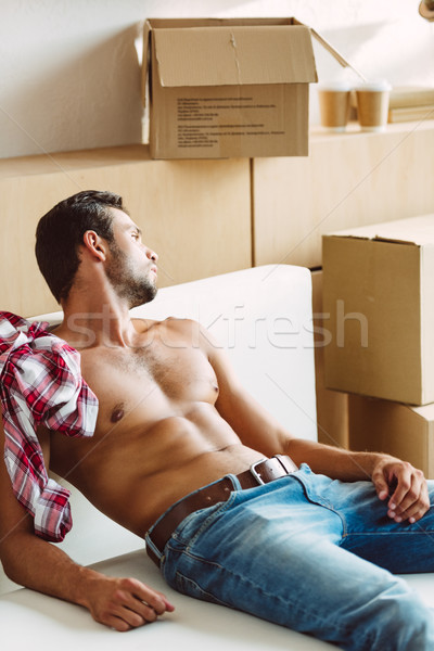 shirtless man moving in new house Stock photo © LightFieldStudios