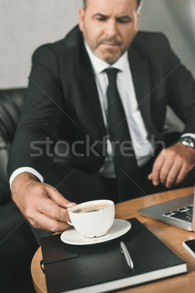 Stock photo: businessman with cup of coffee