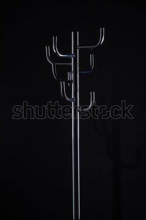 empty coat stand isolated on black Stock photo © LightFieldStudios