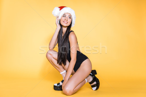 Asian woman in santa hat and swimsuit Stock photo © LightFieldStudios