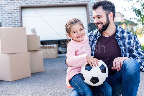 отцовство отец красивой дочь футбольным мячом сидят Сток-фото © LightFieldStudios
