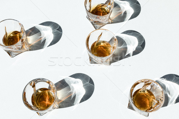 bourbon in glasses with shadows   Stock photo © LightFieldStudios
