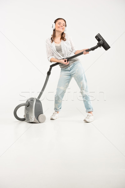 Woman with vacuum cleaner Stock photo © LightFieldStudios