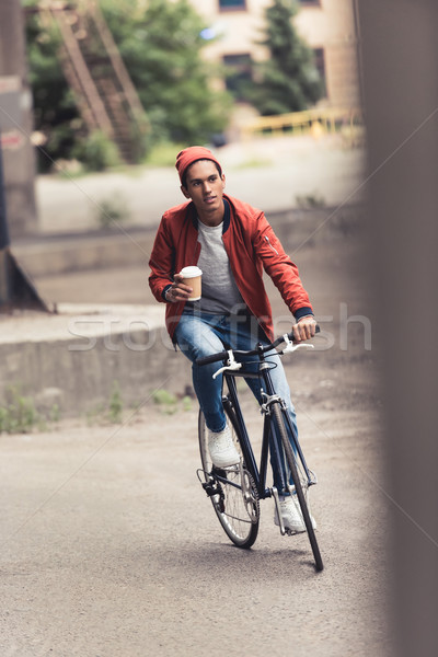 man with bicycle and coffee to go Stock photo © LightFieldStudios