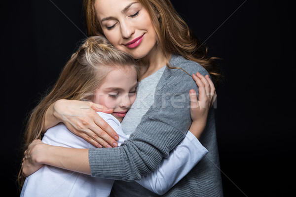 Anya lánygyermek átkarol boldog fiatal aranyos Stock fotó © LightFieldStudios