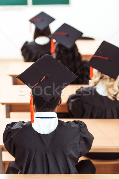 Stock photo: students in graduation hats