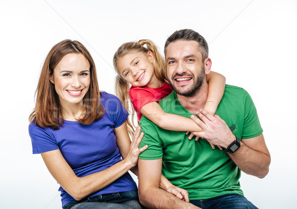 Young family in colorful t-shirts Stock photo © LightFieldStudios