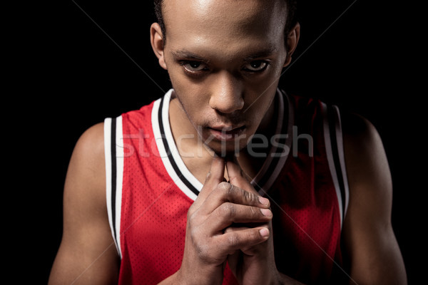 Young confident basketball player in sportswear looking at camera  Stock photo © LightFieldStudios