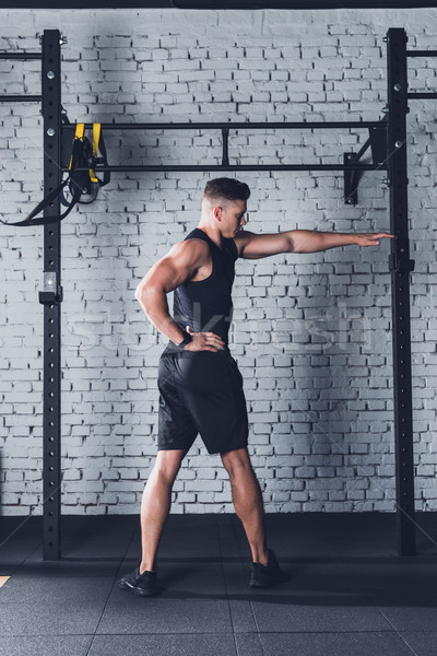 man stretching before training  Stock photo © LightFieldStudios