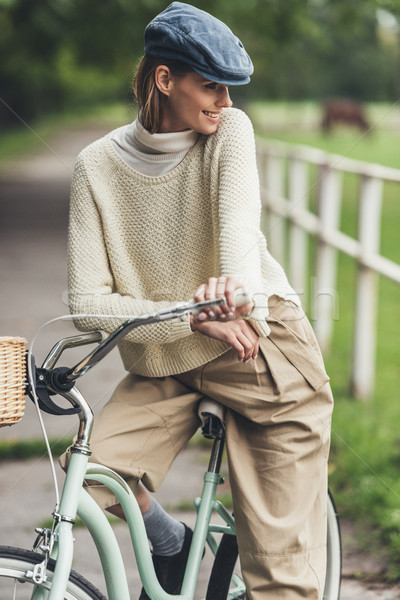 woman sitting on bike  Stock photo © LightFieldStudios