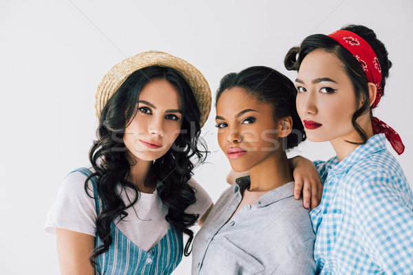 multicultural women in retro clothing Stock photo © LightFieldStudios