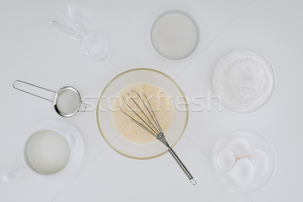 top view of utensils and ingredients for cooking pancakes isolated on grey  Stock photo © LightFieldStudios