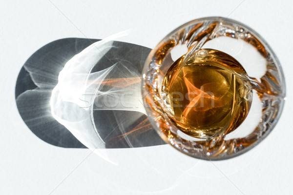 whiskey in glass with shadow Stock photo © LightFieldStudios