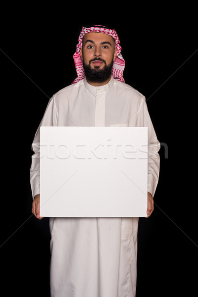 Muslim Mann halten Bord glücklich gut aussehend Stock foto © LightFieldStudios