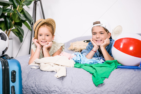 kids with clothes for trip Stock photo © LightFieldStudios