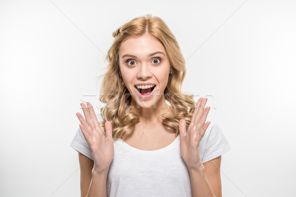 Exited young woman Stock photo © LightFieldStudios