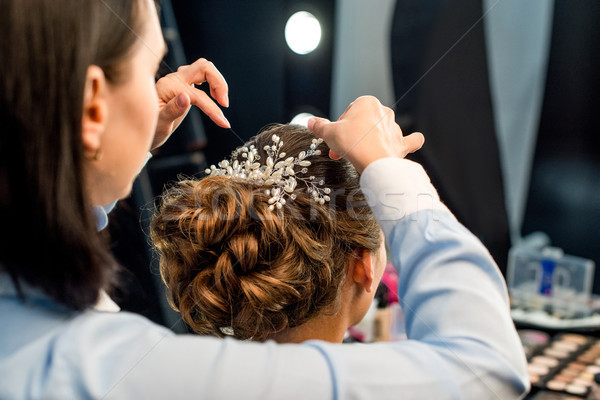 hairstylist decorating clients hairstyle Stock photo © LightFieldStudios