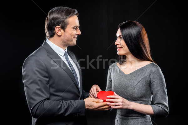 Casal brinquedo coração vermelho sorridente Foto stock © LightFieldStudios