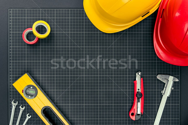 tools and hardhats on graph paper Stock photo © LightFieldStudios