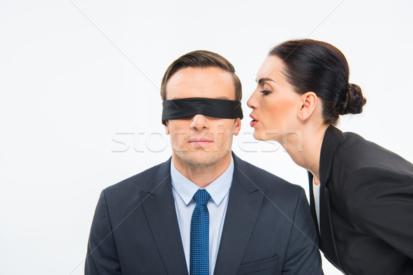 Businessman in blindfold and businesswoman Stock photo © LightFieldStudios