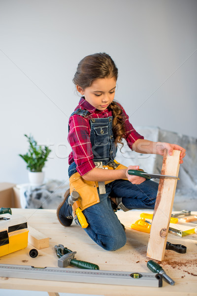 Little girl in workshop Stock photo © LightFieldStudios