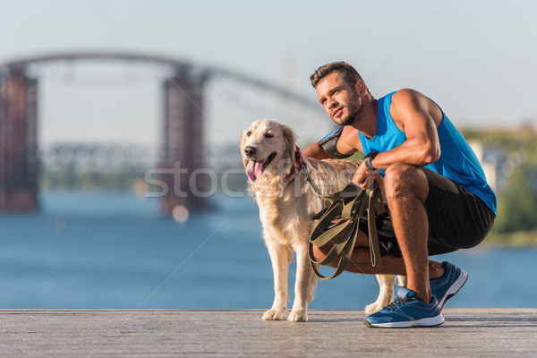 Sportoló kutya rakpart sportos sportoló ölel Stock fotó © LightFieldStudios