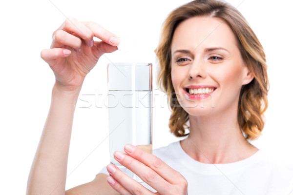 Imagine de stoc: Sticlă · apă · pilulă · femeie · atragatoare · izolat · alb