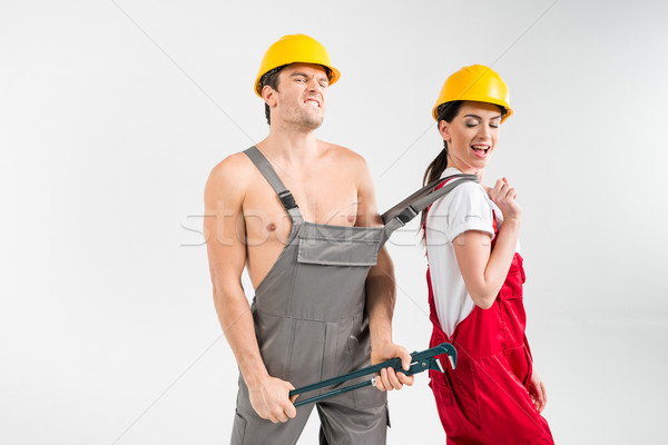 Male and female builders posing Stock photo © LightFieldStudios