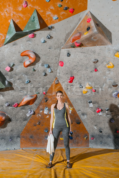 young woman in front of climbing wall Stock photo © LightFieldStudios