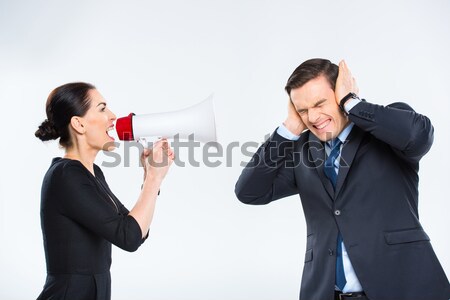 Mujer de negocios gritando empresario jóvenes megáfono blanco Foto stock © LightFieldStudios