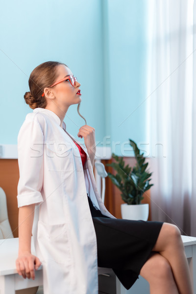 Vue de côté professionnels médecin médicaux uniforme verres [[stock_photo]] © LightFieldStudios