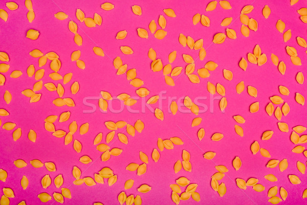 Crudo pasta confuso rosa fondo cocina Foto stock © LightFieldStudios