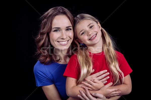 Beautiful smiling mother and daughter  Stock photo © LightFieldStudios