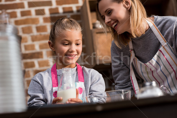 mother and daughter making cookies Stock photo © LightFieldStudios