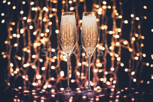glasses full of champagne Stock photo © LightFieldStudios