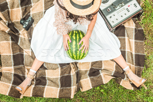 girl with watermelon on plaid Stock photo © LightFieldStudios