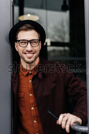 Középkorú üzletember portré szemüveg áll karok Stock fotó © LightFieldStudios
