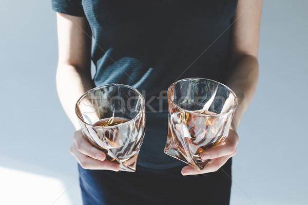 Személy tart szemüveg brandy közelkép kilátás Stock fotó © LightFieldStudios