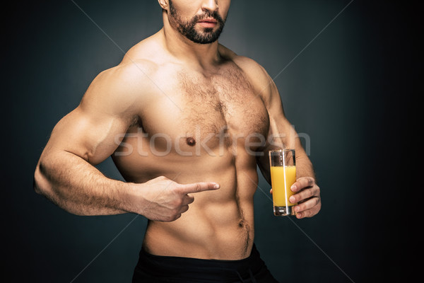 Foto stock: Hombre · vidrio · jugo · tiro · senalando