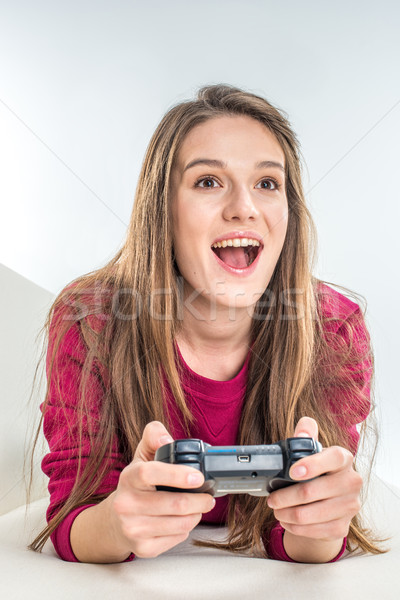 Frau spielen Joystick aufgeregt Mädchen Stock foto © LightFieldStudios
