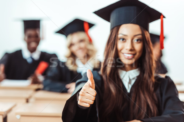student girl showing thumb up Stock photo © LightFieldStudios