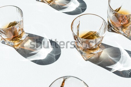 Coñac gafas oscuridad primer plano vista blanco Foto stock © LightFieldStudios