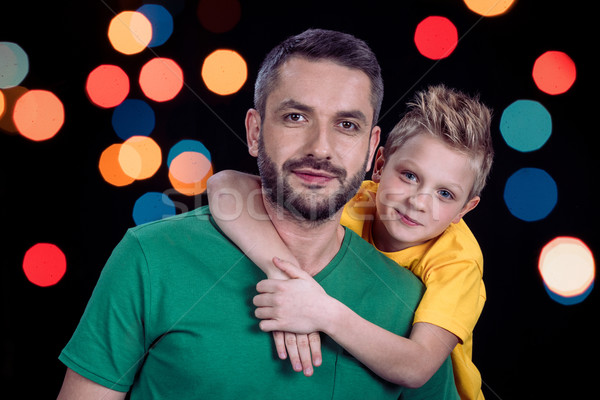 Smiling father and son Stock photo © LightFieldStudios