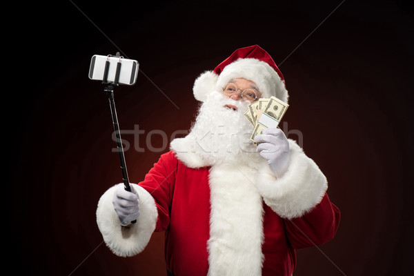 Noel baba dolar mutlu tatil Stok fotoğraf © LightFieldStudios