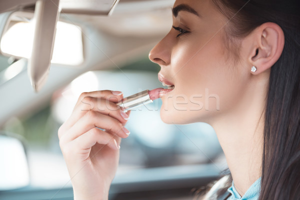 Kobieta szminki samochodu młodych atrakcyjna kobieta Zdjęcia stock © LightFieldStudios